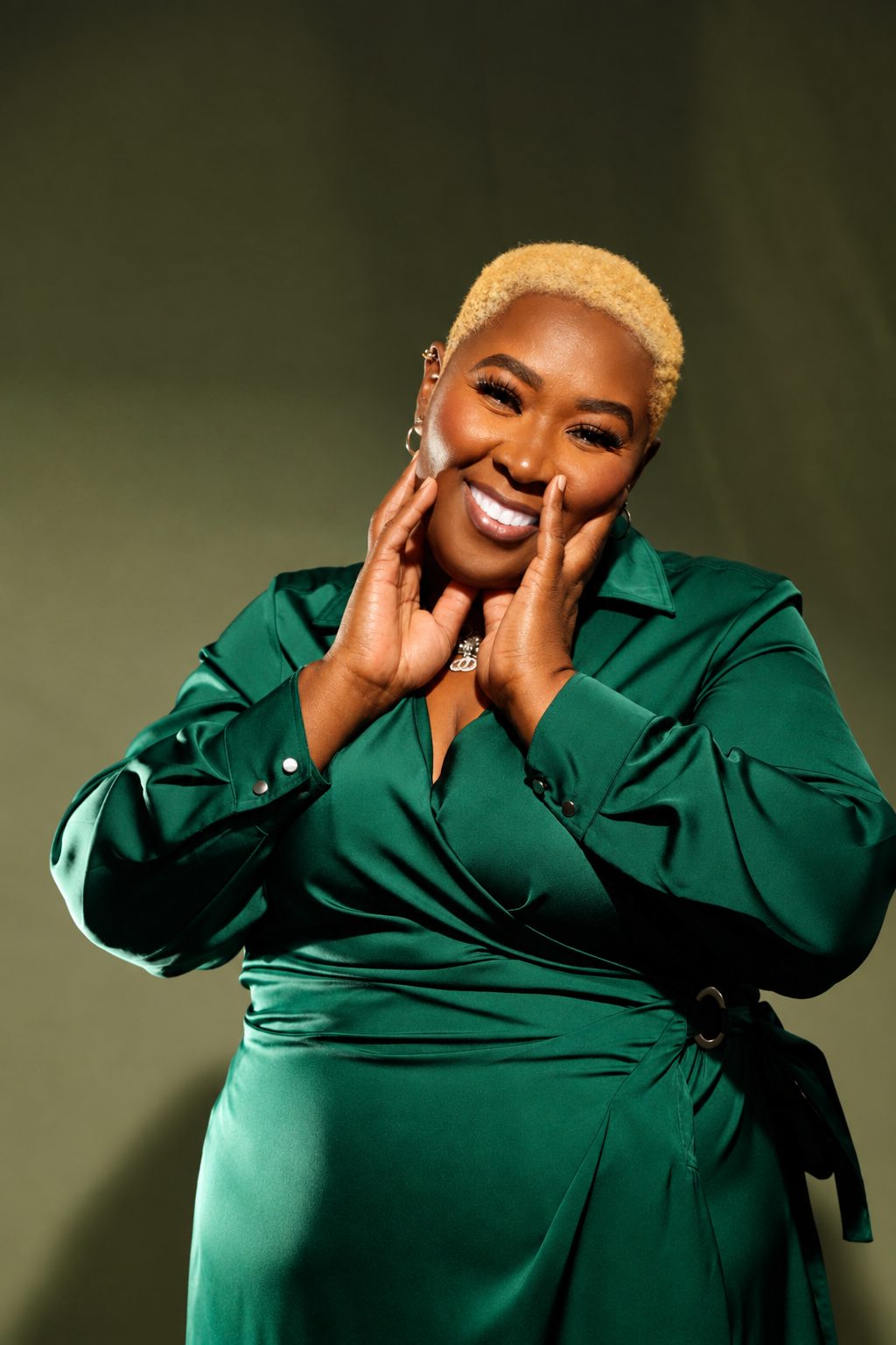 Herbalur CEO smiling confidently in a green dress